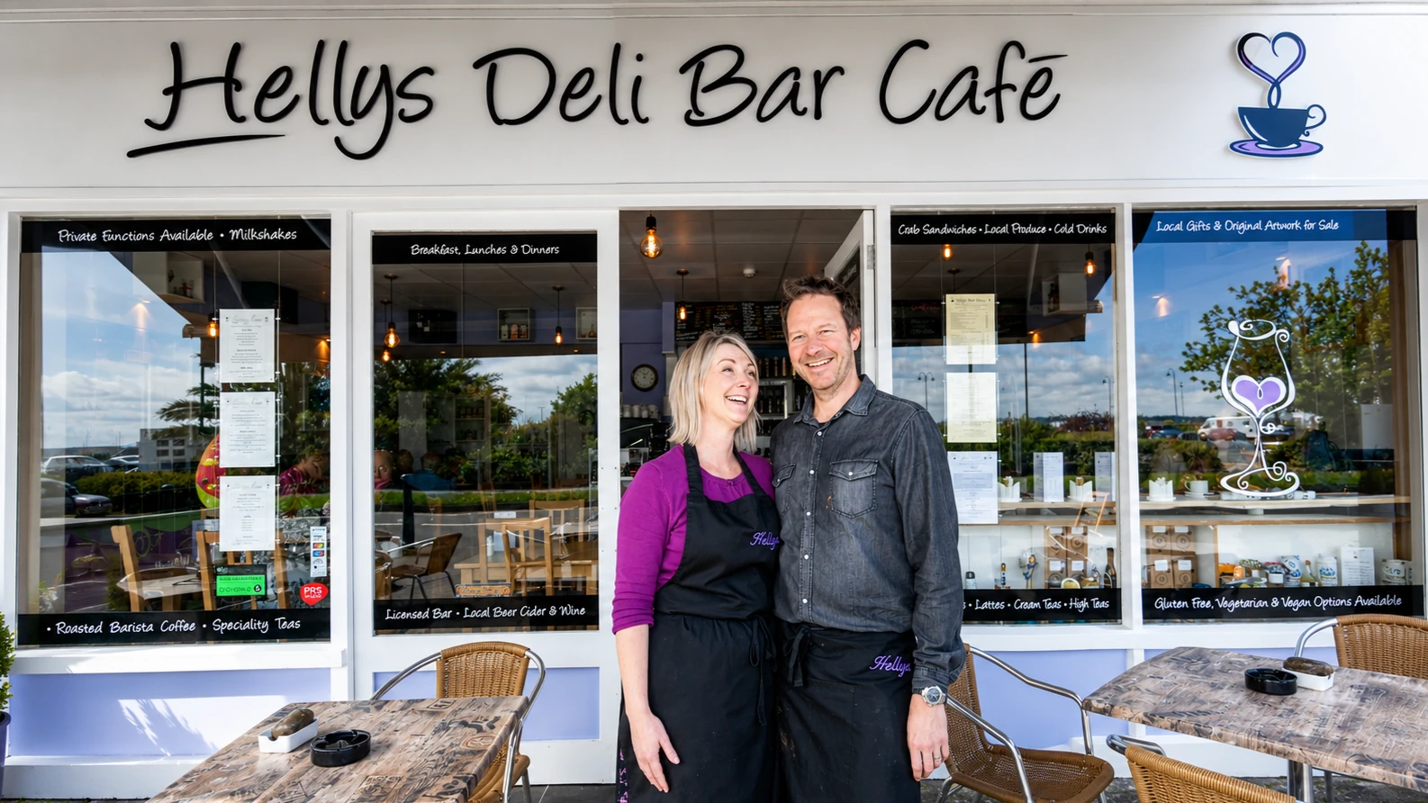 Hellys Deli Bar Café storefront and team